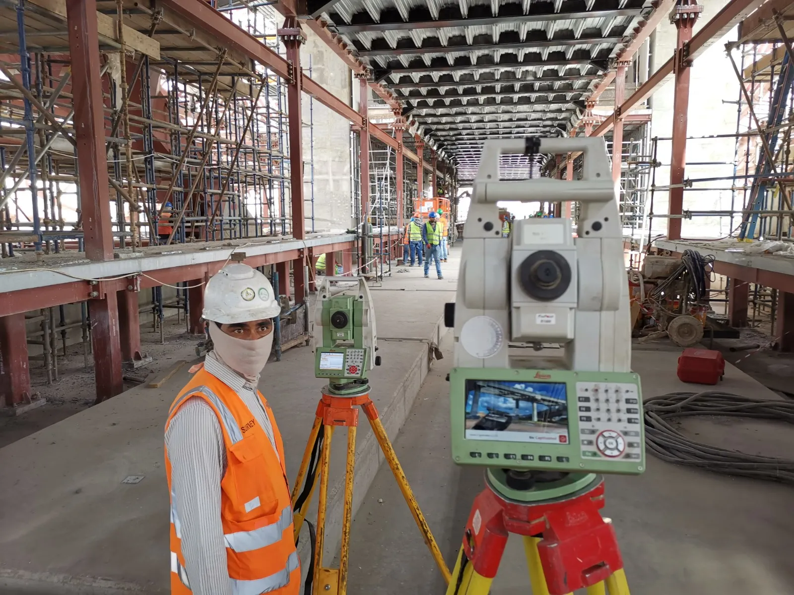 Close-up of a Leica total station on site